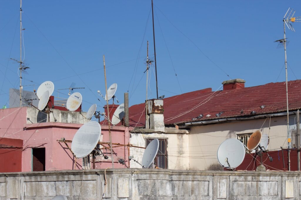 Satellite dish installed on rooftop showing how satellite internet connects homes to the internet
